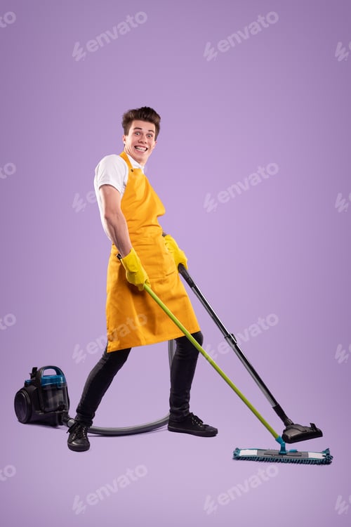 Preview: Funny male housekeeper cleaning floor