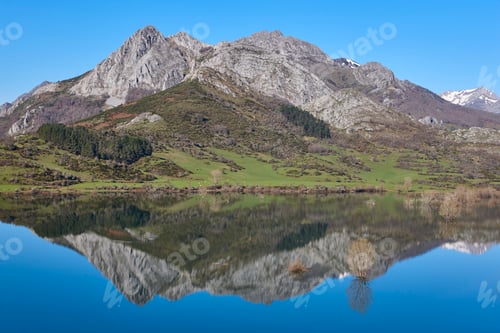 Preview: Picturesque reservoir and mountain landscape in Riano. Mirror effect. Spain