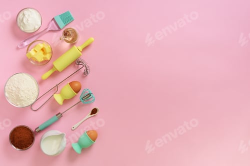 Preview: Bakery food frame, cooking concept. Ingredients on kitchen table. Butter, sugar, flour, eggs, oil