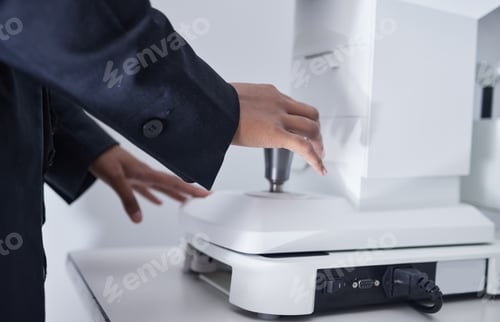 Preview: Ophthalmologist, ophthalmology and optometrist hands using eye exam machine for vision care, health
