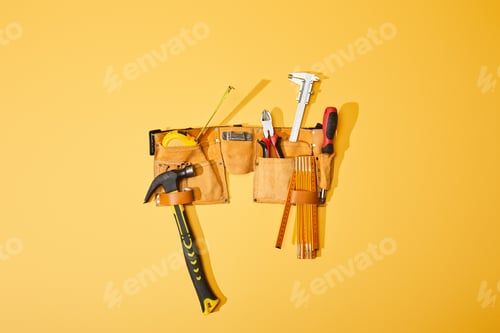 Preview: top view of tool belt with hammer, pliers, measuring tape, calipers, screwdriver and folding ruler