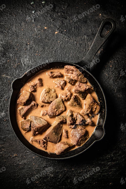 Preview: Liver cooked in a frying pan.