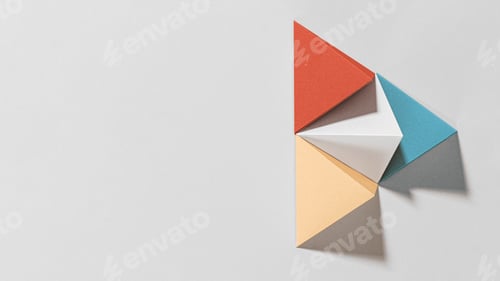 Preview: 3D colorful pyramid paper craft on a gray background