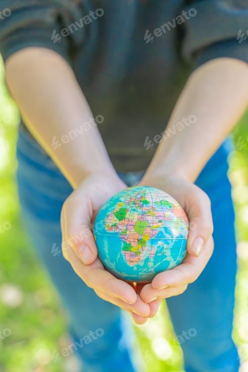 Preview: Human hands holding global earth ball. Sustain earth concept. Love nature. Save the planet.