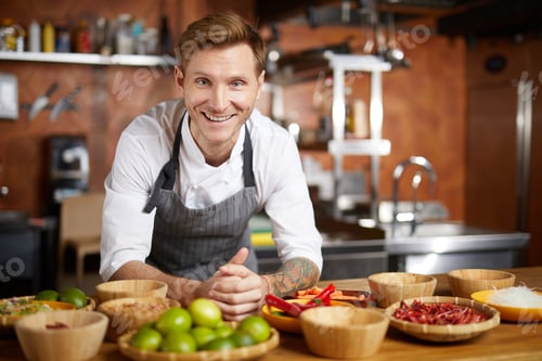 Preview: Portrait of Smiling Chef in Kitchen