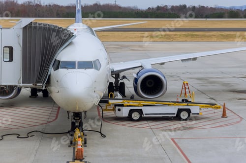 Preview: Loading of cargo containers to plane at preparing airplane before flight