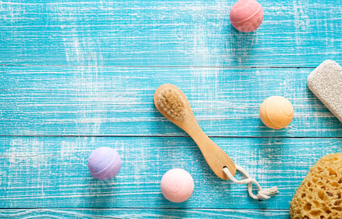 Preview: Spa composition with brush and bath bombs, flat lay.