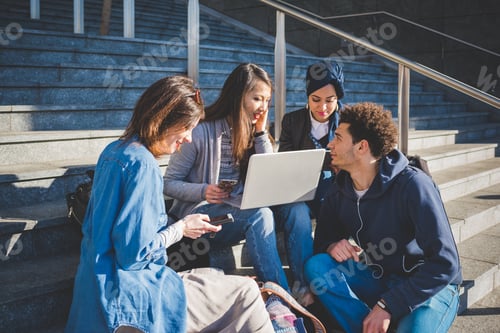 Preview: Multiracial group young people using technology