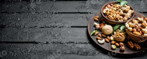 Preview: Assortment of different types of nuts in bowls.
