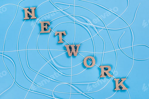 Preview: The word network with wooden letters in the form of an abstract spider web