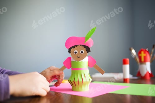 Preview: paper craft for kids. DIY toy Black Pete Zwarte Piet for sinterklaas day. create art for children.