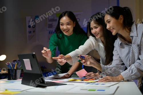 Preview: Diverse Team of Young Women Collaborating on a Project in a Modern Office Environment