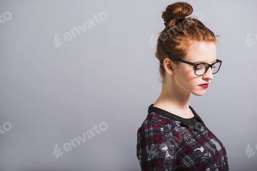 Preview: Woman in Glasses Poses in Studio Profile