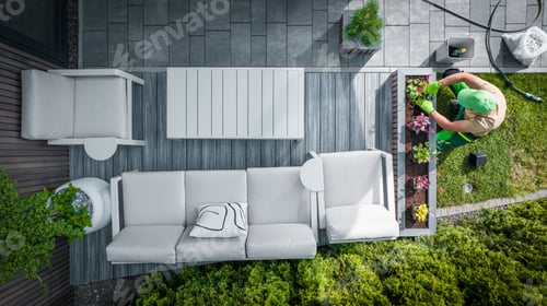 Preview: Gardener Planting Flowers in Modern Backyard Setting