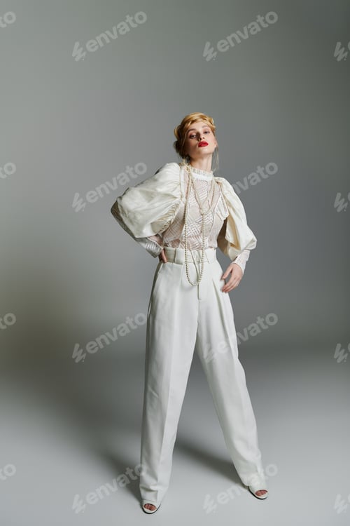 Preview: Woman Posing in Elegant White Outfit