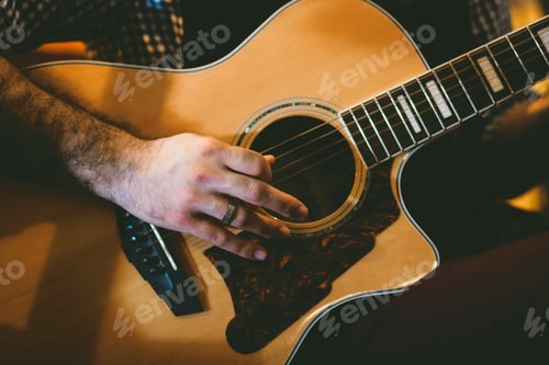 Preview: Playing classic guitar. Selective focus.