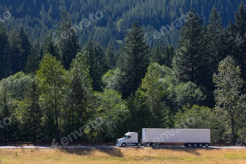 Preview: commercial truck on a highway in the mountains east of Seattle, Washington USA