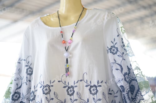Preview: Clothes that are on the dummy and necklaces