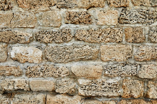 Preview: Background of the stone wall of the castle made of stones of different shapes and sizes and textures