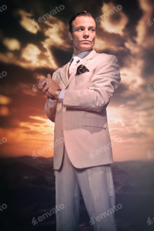 Preview: Retro Fashion Business Man Wearing White Striped Suit And Tie. Heroic Standing In Front Of Rough