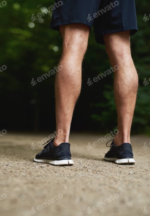 Preview: Legs of a fit muscular athletic man