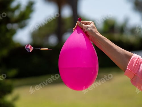 Preview: SSequence of the launch of a dart against a water-filled balloon and its subsequent explosion.
