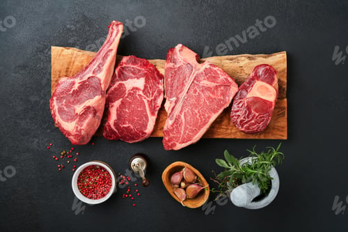 Preview: Raw prime steaks. Variety of fresh black angus prime meat steaks T-bone, New York, Ribeye, Striploin