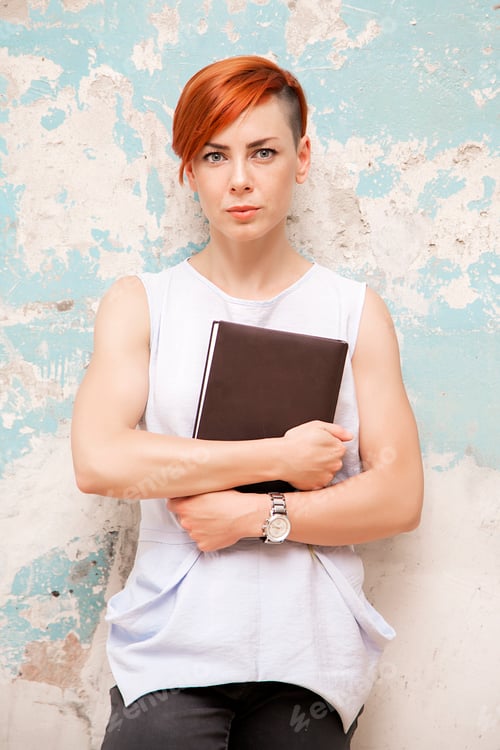 Preview: Young red hair woman with file