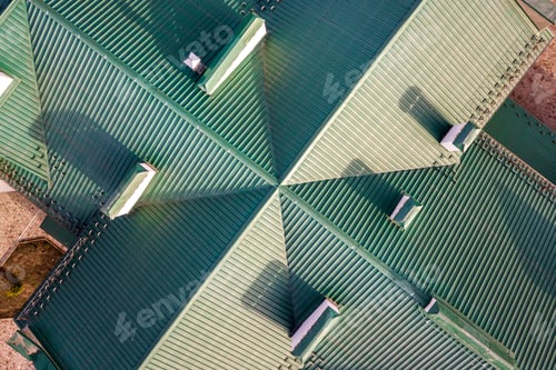 Preview: Top aerial view of building green shingle tiled roof construction.