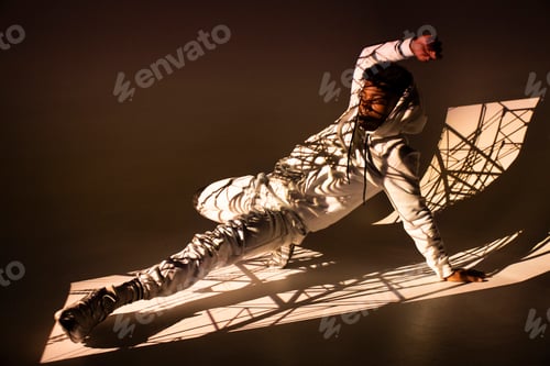 Preview: Black man dancing under bright light
