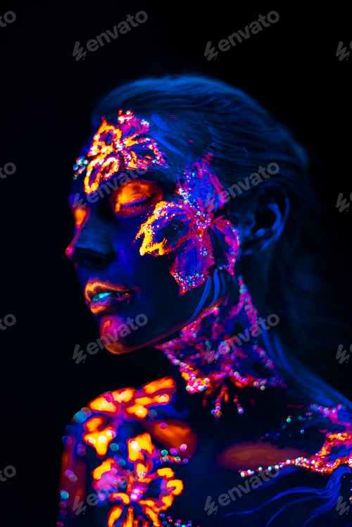 Preview: Beautiful flowers in UV light on a young girl face and body