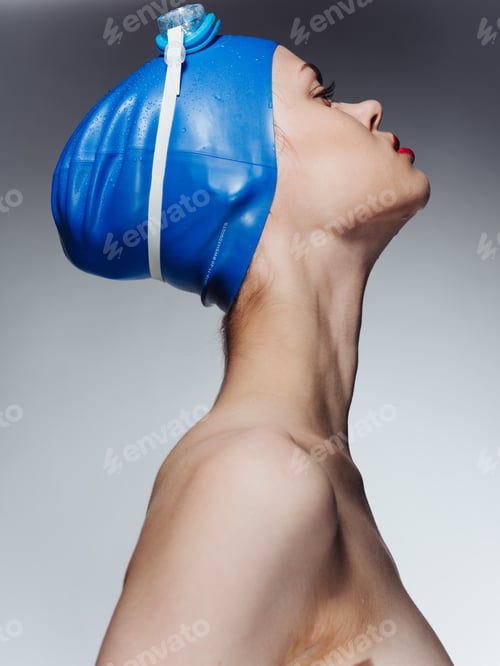 Preview: Woman in swimming cap with red lips makeup model naked shoulders