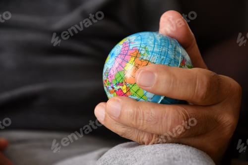 Preview: Man holding a globe