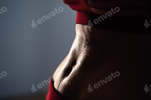 Preview: The beautiful female sporty body after training.