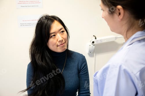 Preview: Nurse talking to a patient in a medical practice
