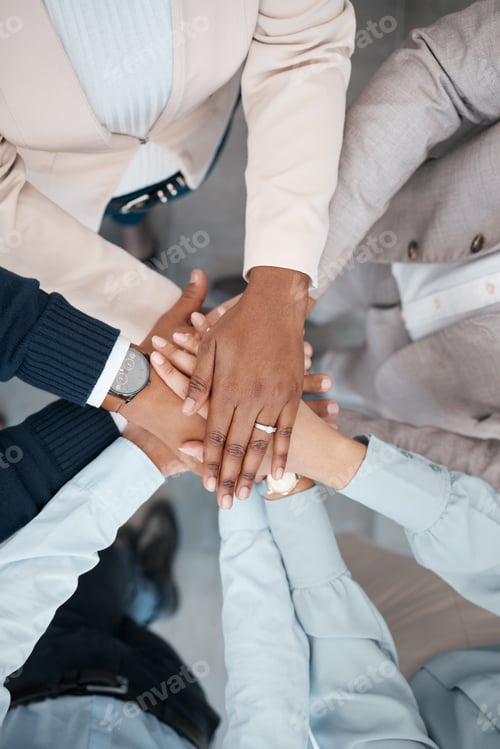 Preview: Hands, collaboration and solidarity with a team of business people standing in a huddle or circle i