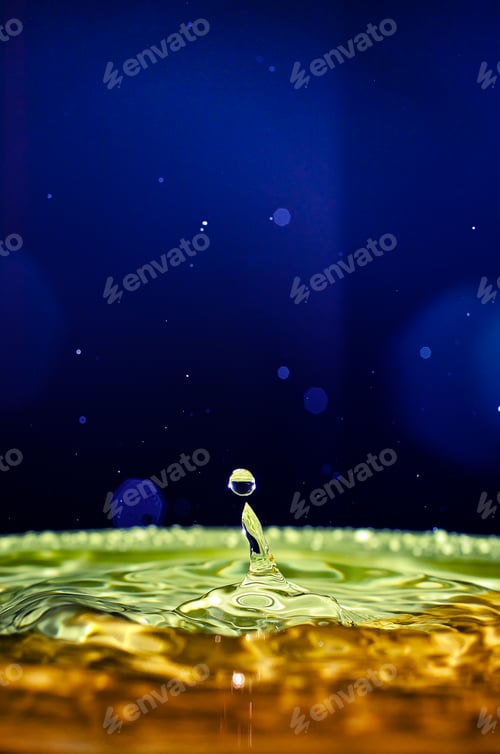 Preview: The water drop with interesting colorful blurred background
