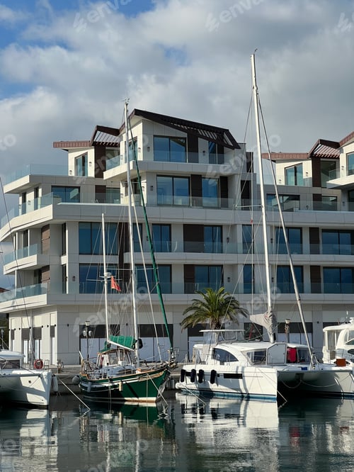 Preview: Sailing yachts are moored near the hotel on the seashore