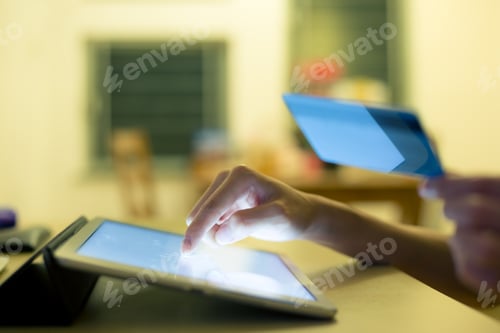 Preview: Woman use of digital tablet at home