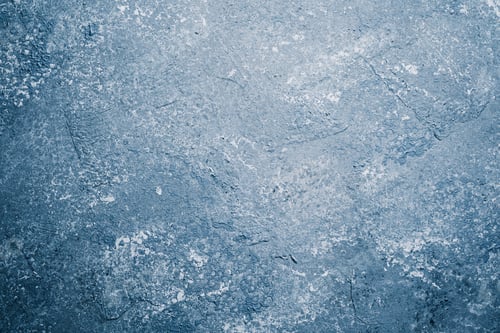 Preview: Grunge blue plaster wall with weathered texture and mottled pattern