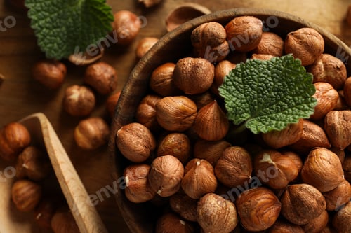 Preview: Healthy food and healthy nutrition concept, nuts - hazelnut