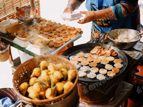 Preview: Thai Coconut pancake dessert Street food. Taken at a floating market in Pattaya, Thailand May 20, 20