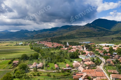 Preview: Aerial drone view of small village in the Trascau Mountains, Transylvania, Romania.