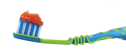 Preview: Manual child toothbrush with paste isolated on white