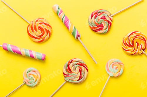 Preview: Set of colorful lollipops on colored background. Summer concept.