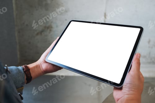 Preview: Mockup image of a woman holding black tablet pc with blank white screen in cafe