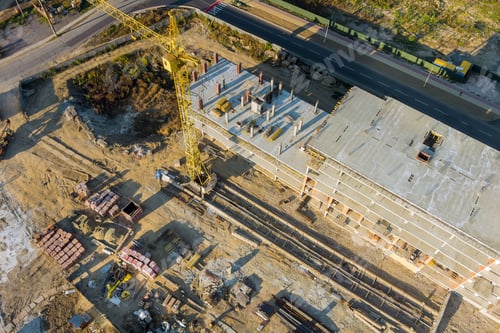 Preview: Tower crane on a construction site high-rise building under construction modern residential complex