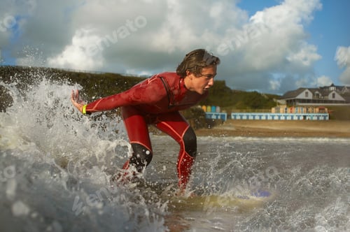 Preview: Teenage boy, surfing