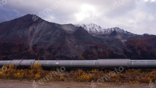 Preview: The Trans-Alaska Pipeline Passes in front Of Mountains and Tundra