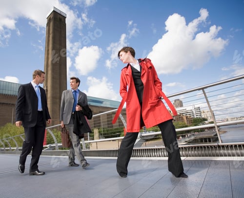 Preview: Business people talking on walkway